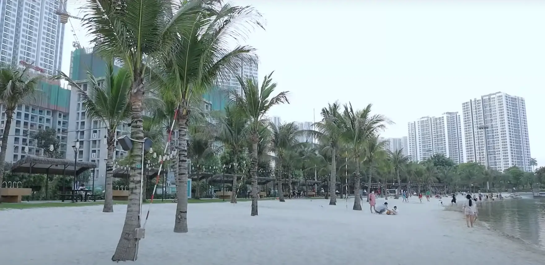 White sandy beach by the lake